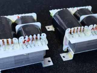 custom electrical transformers with laminated cores and terminal connections for UK manufacturing