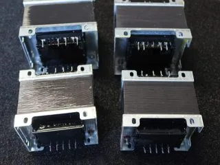Group of four laminated E-I core transformers